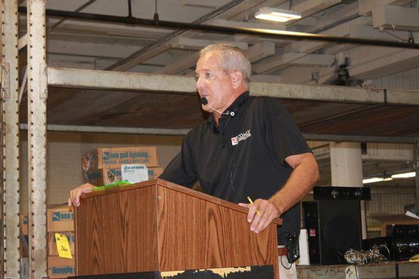 President Steve Comly on auction day.
