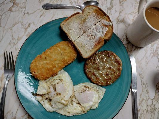 Breakfast combo #7: Two eggs, hash brown, two slices of toast of your choice, bacon or sausage. $10.49.