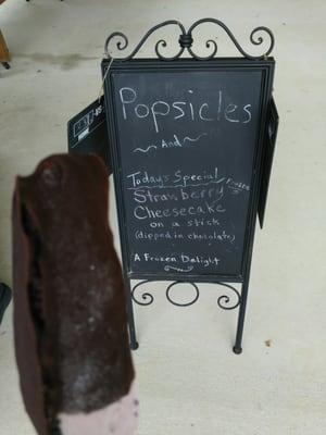 Homemade strawberry cheesecake popsicle