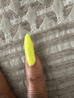 Clumpy polish at the bed of my nail.