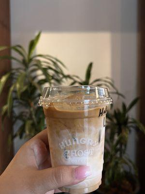 Iced latte, half caff, with whole milk