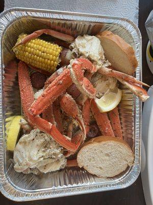 Crab boil - includes crab, sausage, corn on the cob, potatoes, lemon and bread.