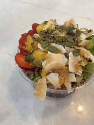 Granola acacia strawberries kiwi mango pepita seeds toasted coconut