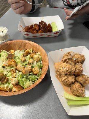 Small Coop Caesar Salad, dead Dracula boneless wings, and white street cauliflower