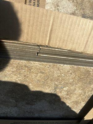 Broken tiles that did get delivered that he knew about.