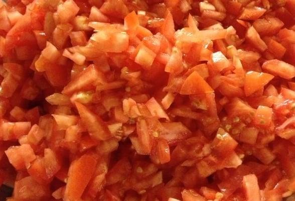 Chopped up fresh ripe vine tomatoes. Ready for the ceviche!