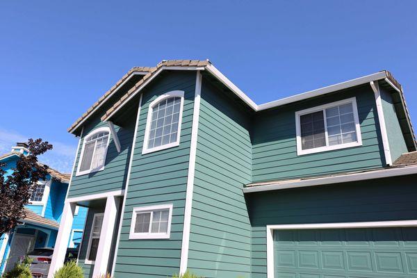 Green Siding and Paint
