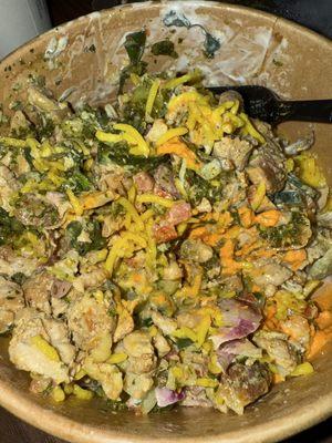 Chicken shawarma bowl with saffron rice veggies and sauces