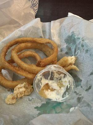 A larger picture of the onion rings the one I've bit into was raw and I spit it out immediately