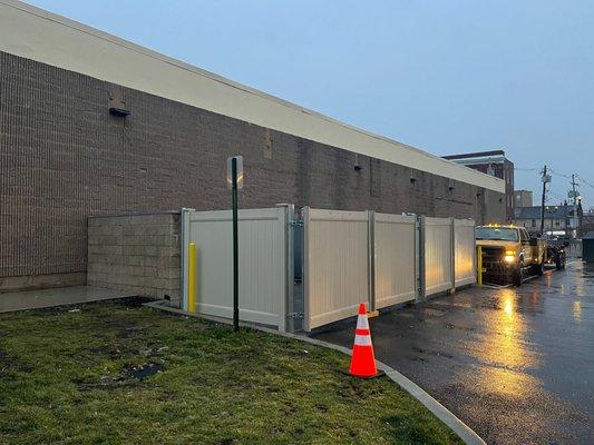 vinyl sections for dumpster enclose .