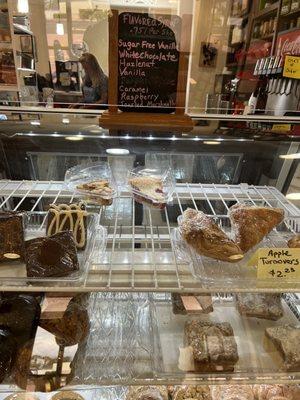 Dessert Case and list of coffee syrups