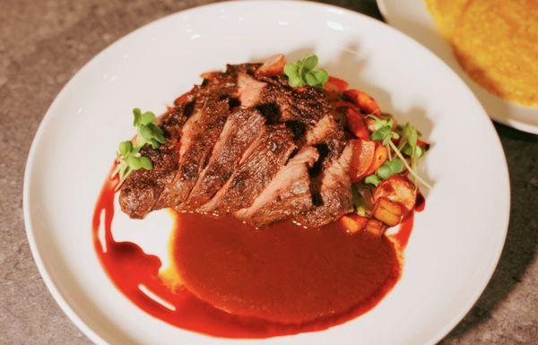 Carne Asada, arrachera steak served with veggies and homemade corn tortillas