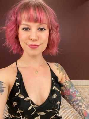 Hot pink, and short cut. (October 2022)