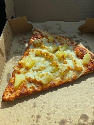 Slice of pizza with onion and pineapple. Soooooo good! Crispy yet soft crust.