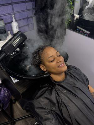 Steam treatment on natural hair.