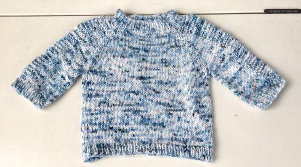 Hand knit baby sweater from Whidbey Isle Yarns hand dyed yarn