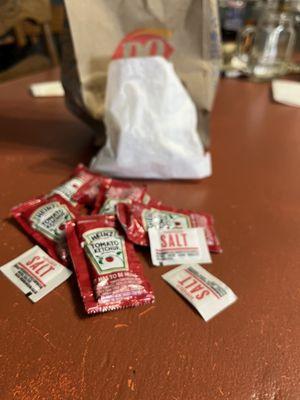 Small fries with SIX ketchup packets and THREE salt packets. Isn't this overkill?