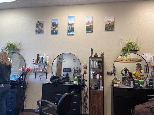 Salon stations with cute decor.