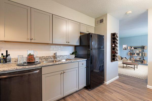 The updated units have new appliances, new kitchen cabinets, new plumbing and new granite countertops