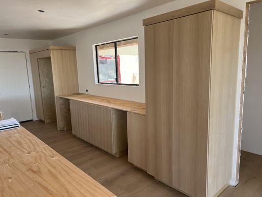 Rift white oak full overlay slab style casework