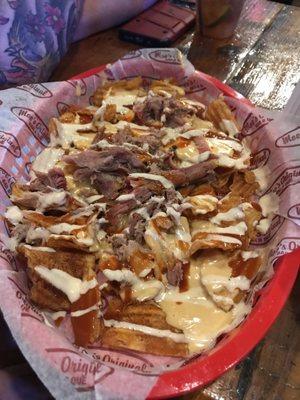 Redneck nachos, really good. The queso is super good on it