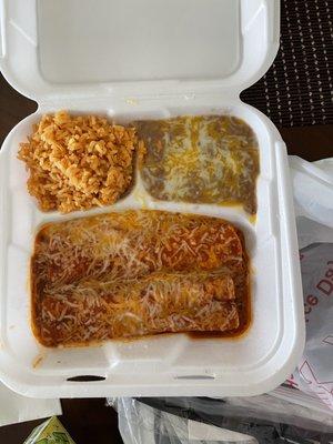 2 chicken enchiladas with beans and rice. Chicken enchiladas we pretty good, but the rice and beans were no way homemade.
