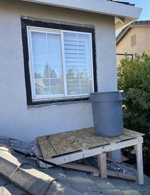 Getting ready to remove this old window. Custom floor platform built for safe access and a clean install.