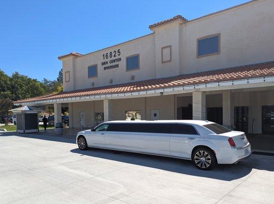 Outside, groom arrived in the limo.