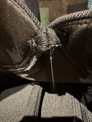 Needle left in dress