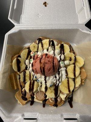 Cheesecake spread, bananas, cupcake bites, white chocolate chips, strawberry gelato, whipped cream and chocolate drizzle.