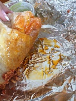 Bottom of my burrito. Had to choose the lesser of two evils: being hungry or potentially having a heart attack after breakfast.