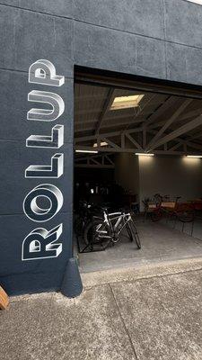 Storefront with a rollup garage door.