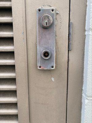 A broken escutcheon mortise lock