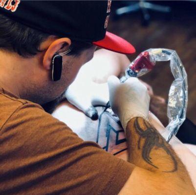 LJ putting in work doing some, knot work on the ribs