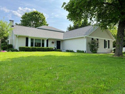 A beautiful Zionsville home updated with James Hardie Siding and painted brick. It's the best looking house on the St... completed in 2022.