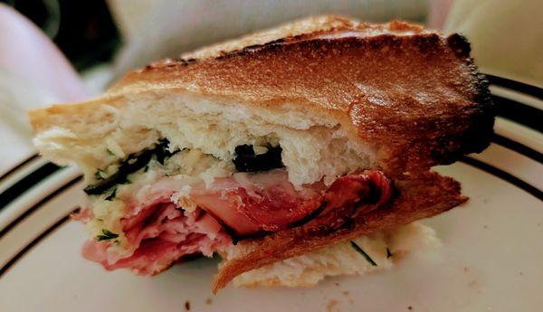 Fat Marco Polo salami, mortadella, capicola, provolone, garlic butter, onions, olives