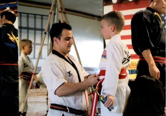 Students earn belts when they have demonstrated mastery of martial arts techniques. It build self confidence and self respect.