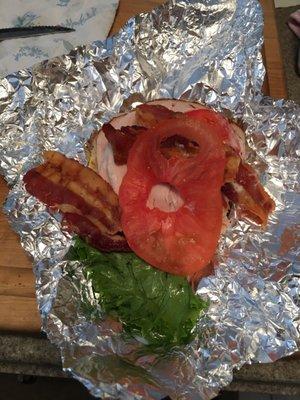 The staff who were cooking were miserable, didn't have decent sanitation the tomato was icing on the cake of bacon cooked god knows when.