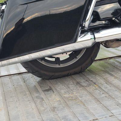 Adam expertly towed our motorcycle when we had a flat.