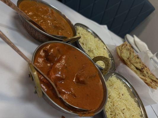 Chicken Tikka Masala(upper left), Butter Chicken(bottom left) Garlic Naan(upper right)