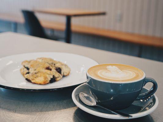 You can't go wrong with a traditional Latte and Blueberry Lemon Zest Scone.