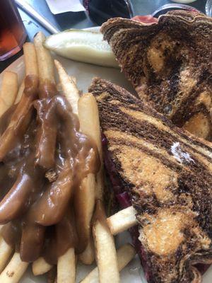 Reuben sandwich, French fries with brown gravy.