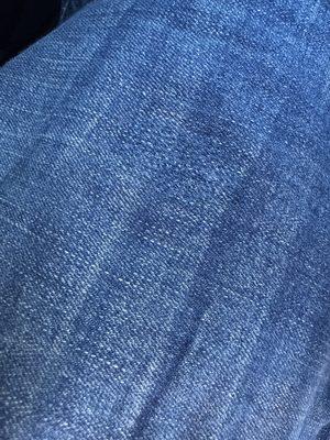 Repairs jeans. You can barely see the repair - amazing job!