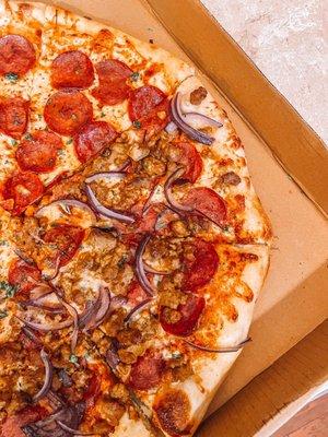 Half pepperoni, half pepperoni / sausage / red onion