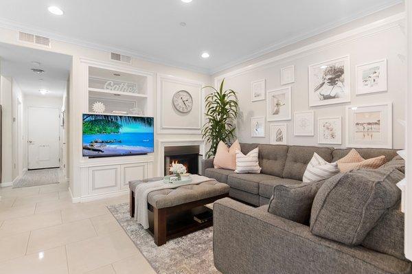 Designed this living room with poster art from past travel inspiration -live plants is a must!