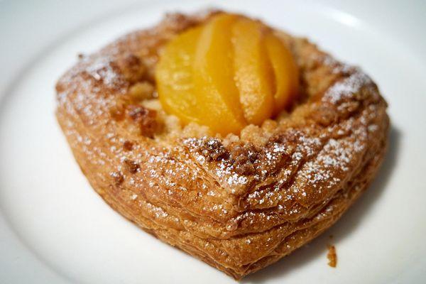 Peach Danish w/ local honney, oolong pastry cream, peach jam, brown butter almond streusell