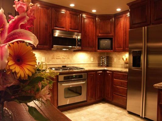 The pulls drawers inside are stained the same as the out side!!