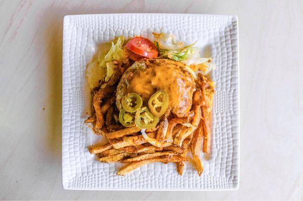 Chili cheese burger with homemade fries. I got this to go! So good! So pretty I took this picture. Lol!