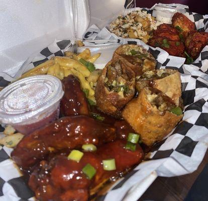 (Left) Wings+CheeseFries+ Cheesesteak Egg Rolls (Right) Wings+Crabby Fries