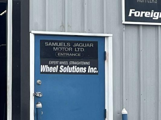 Located inside a Jag repair shop - was great to see some classic cars being worked on alongside mine!